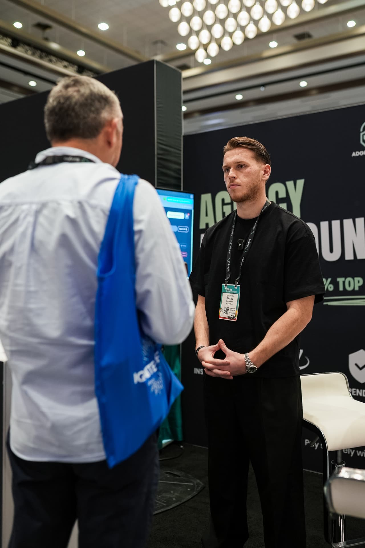 One-on-one conversation with an advertiser at the Ad Guardians booth